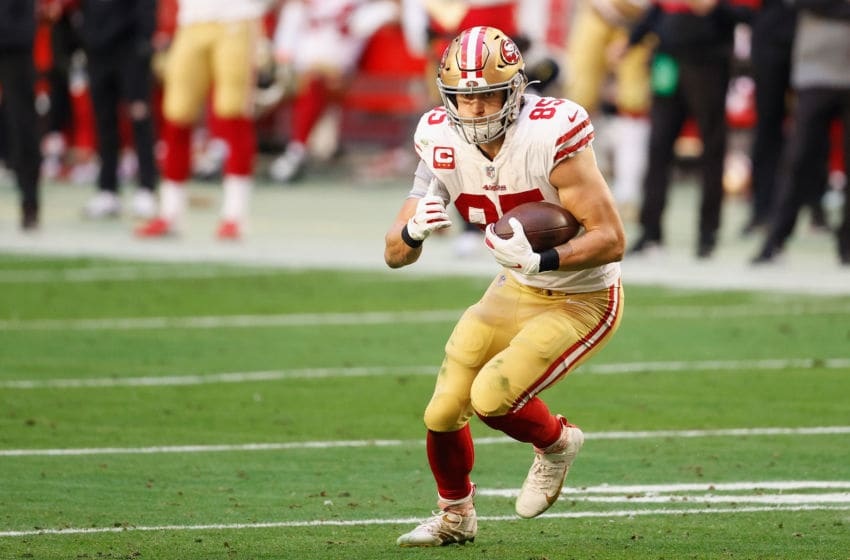 GLENDALE, ARIZONA - JANUARY 03: Tight end George Kittle #85 of the San Francisco 49ers runs with the football after a reception against the Seattle Seahawks during the first half of the NFL game at State Farm Stadium on January 03, 2021 in Glendale, Arizona. (Photo by Christian Petersen/Getty Images)