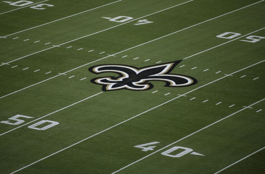 JACKSONVILLE, FLORIDA - SEPTEMBER 12: The New Orleans Saints logo is seen on the field before the start of a game against the Green Bay Packers at TIAA Bank Field on September 12, 2021 in Jacksonville, Florida. (Photo by James Gilbert/Getty Images)