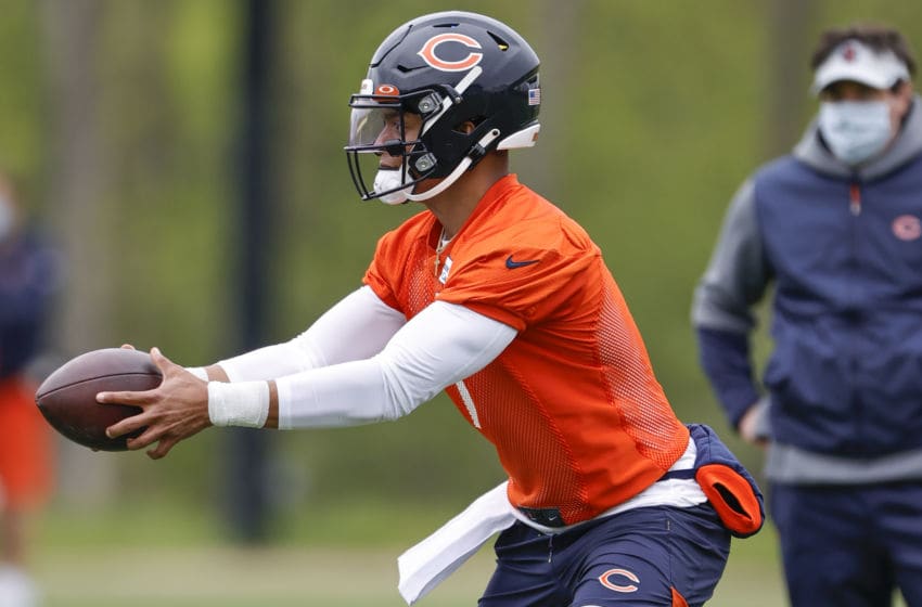 May 15, 2021; Lake Forest, Illinois, USA; Chicago Bears quarterback Justin Fields (1) works out during rookie minicamp at Halas Hall. Mandatory Credit: Kamil Krzaczynski-USA TODAY Sports