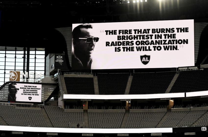 A video board displays an Al Davis quote (Photo by Ethan Miller/Getty Images)
