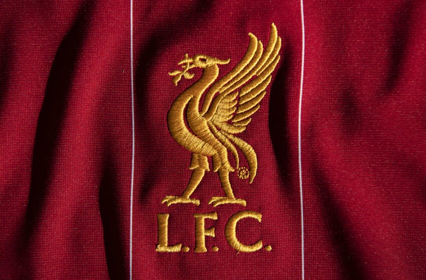 MANCHESTER, ENGLAND - MAY 06: The Liverpool club crest on the first team home shirt displayed on May 6, 2020 in Manchester, England (Photo by Visionhaus)