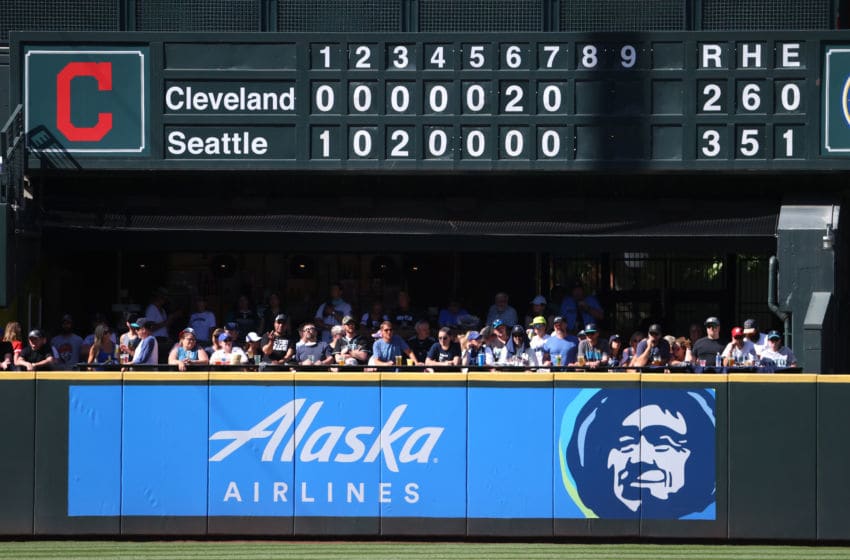 SEATTLE, WASHINGTON - MAY 16: Fans watch play from a designated area for fully vaccinated fans during a game between the Seattle Mariners and Cleveland Indians. (Photo by Abbie Parr/Getty Images)