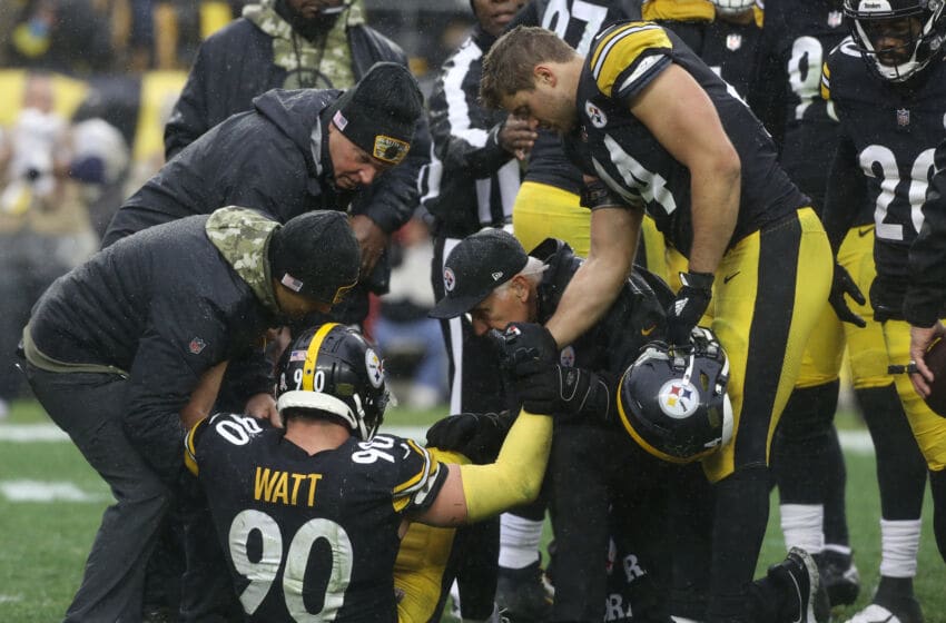 Pittsburgh Steelers team trainers attend to outside linebacker T.J. Watt (90). Mandatory Credit: Charles LeClaire-USA TODAY Sports