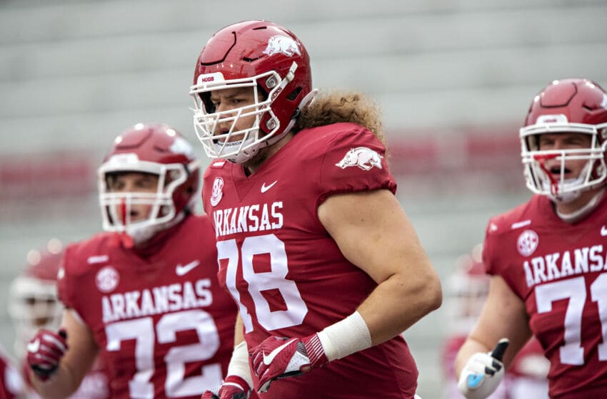 Arkansas Football player inks historic NIL deal with WWE