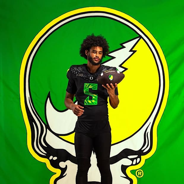 Oregon Ducks football team wearing tie-dye uniforms