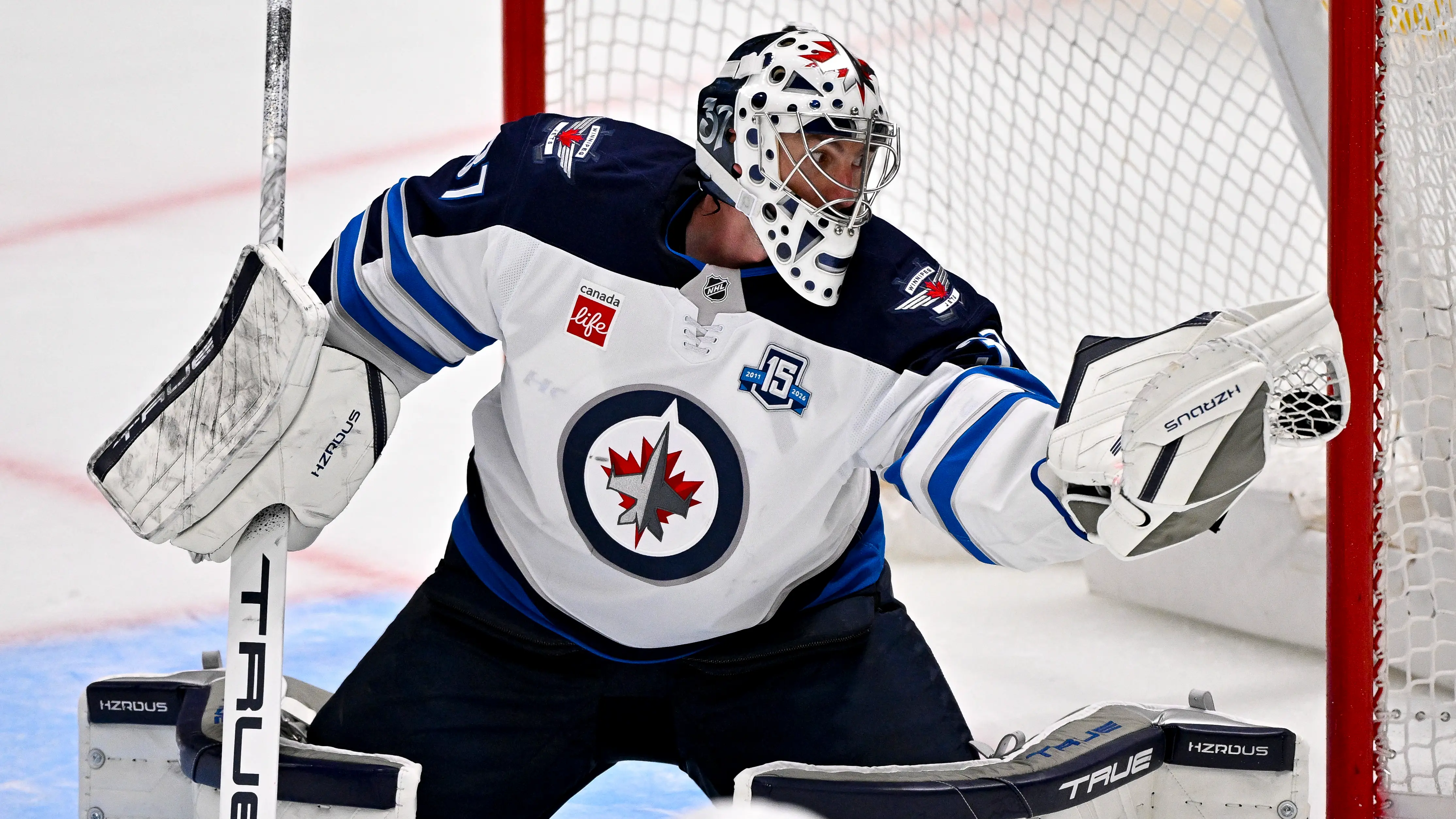 Connor Hellebuyck in Winnipeg Jets gear