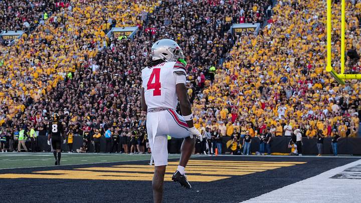 Jeremiah Smith number 4 recreating the Heisman Trophy pose in the Iowa end zone on October 3 2026
