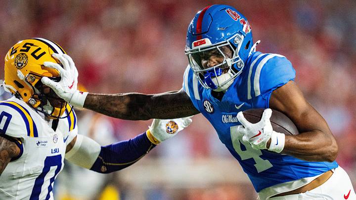 Caleb Odom stiff arms LSU defender Tamarcus Cooley during Ole Miss 32-24 win on September 19 2026