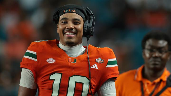 Miami Hurricanes quarterback Darian Mensah smiles after the 77-7 win over Florida A&M