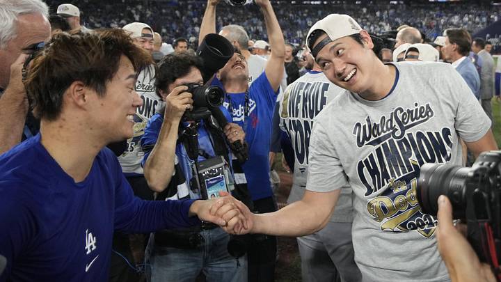 Shohei Ohtani and Yoshinobu Yamamoto celebrate together after the Dodgers won the 2025 World Series