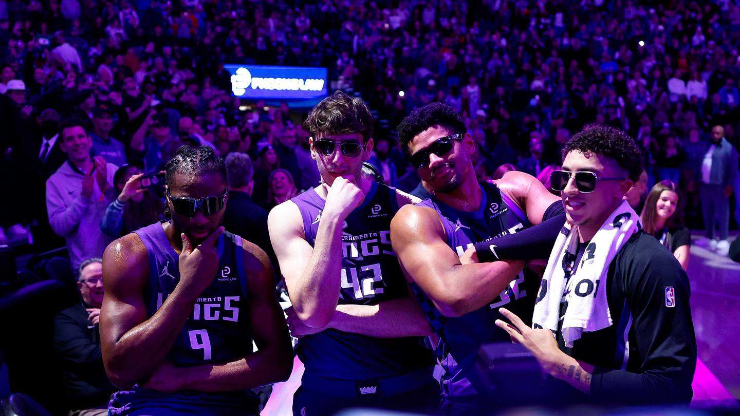 Sacramento Kings Beam Boys Precious Achiuwa Maxime Raynaud Dylan Cardwell and Nique Clifford wearing sunglasses during a 2026 Golden 1 Center celebration