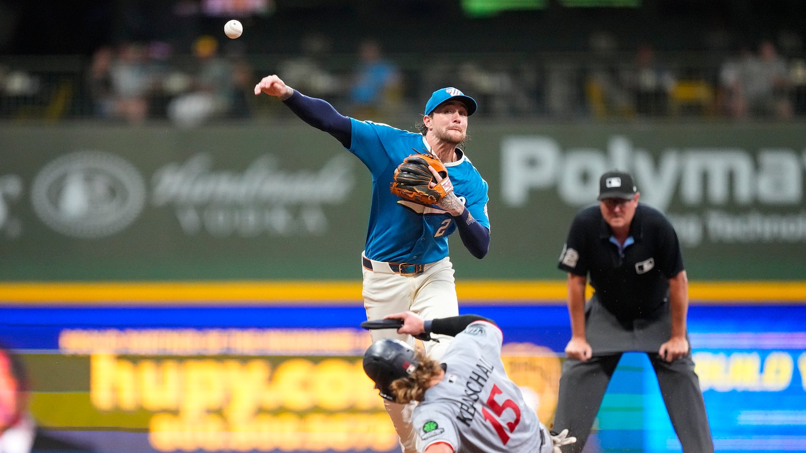 Brice Turang turns a double play against Minnesota in August 2026