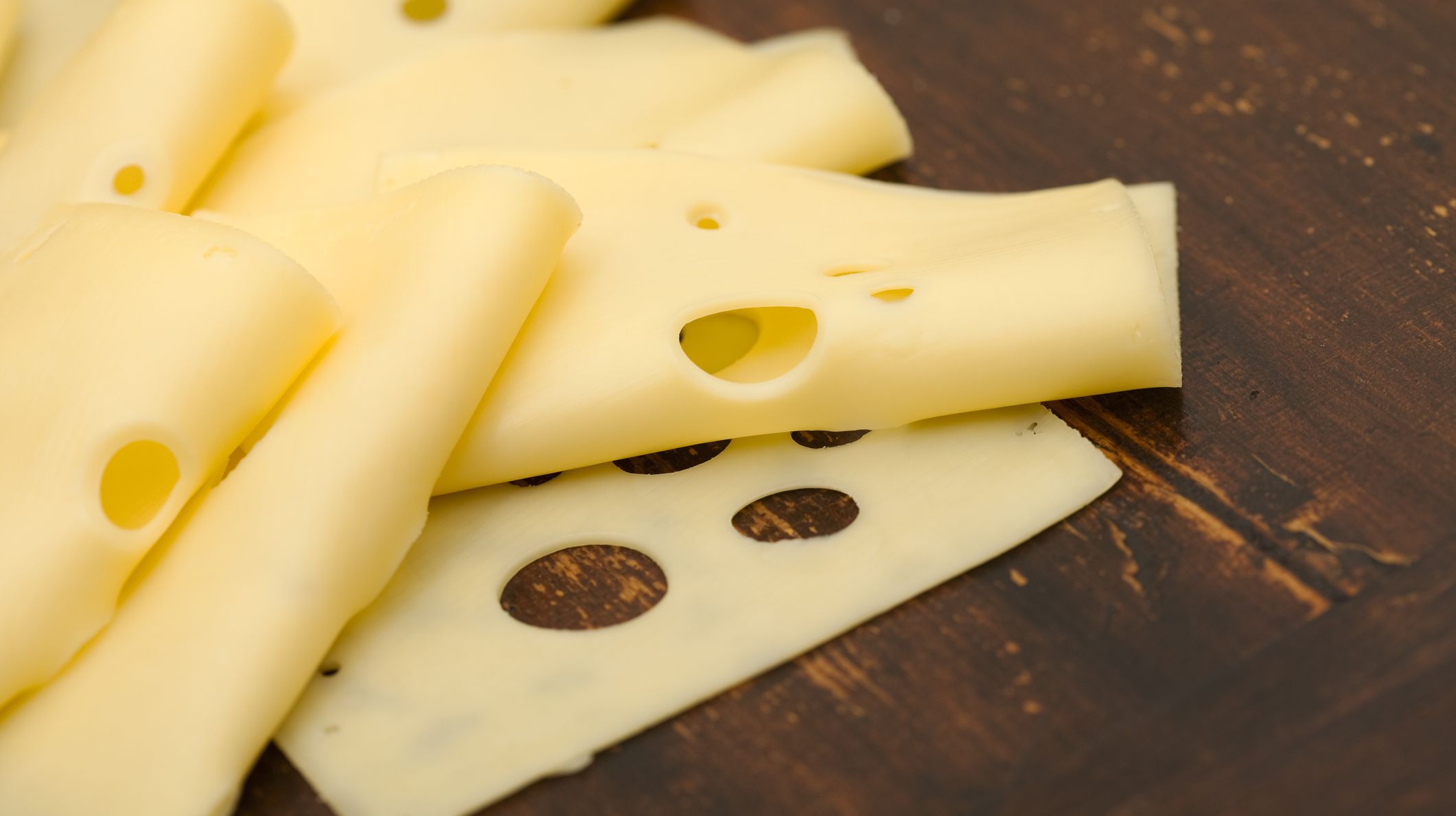 Why Does Swiss Cheese Have Holes? Mental Floss