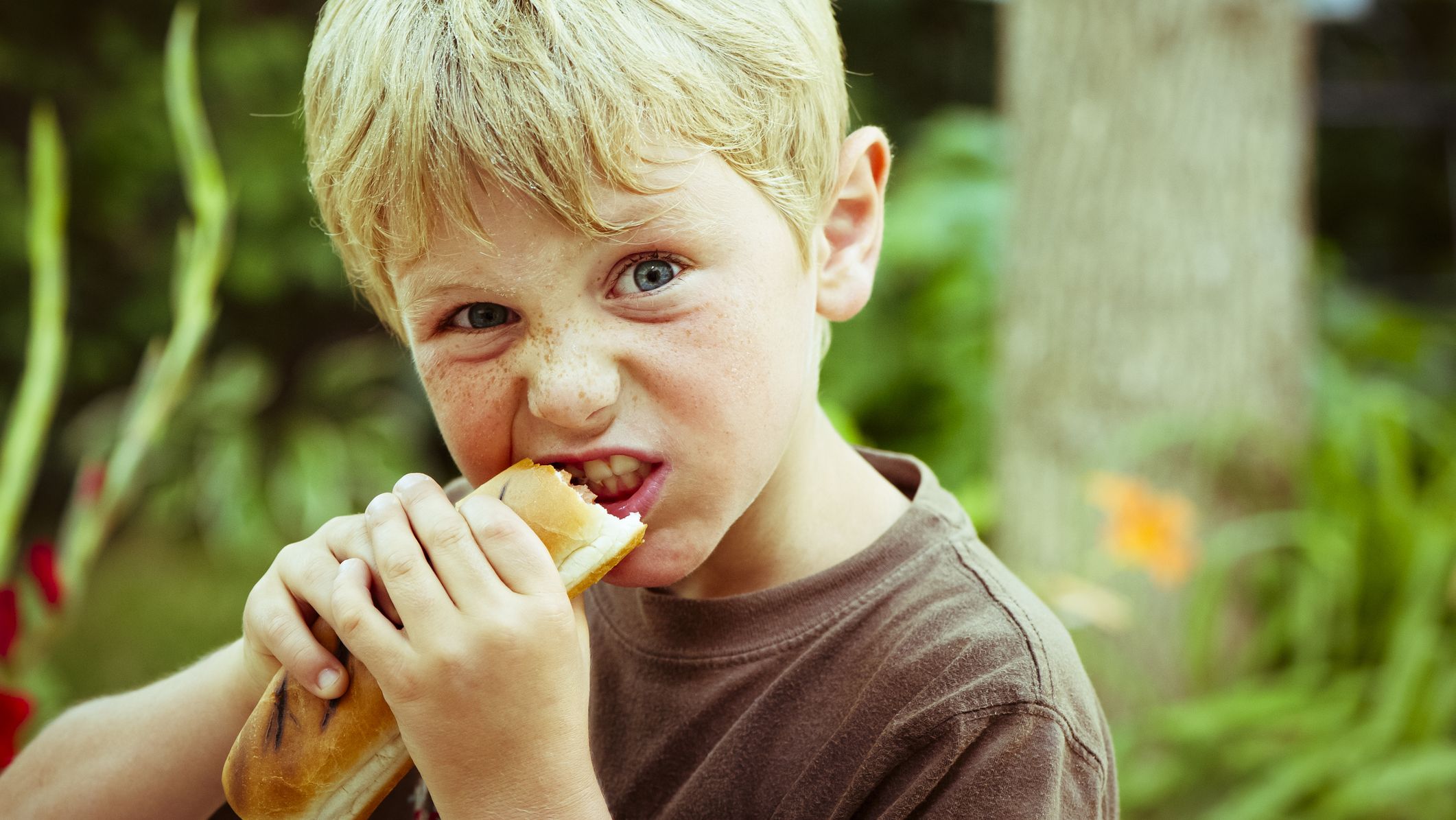 The Proper Way to Eat a Hot Dog, According to the National Hot Dog and