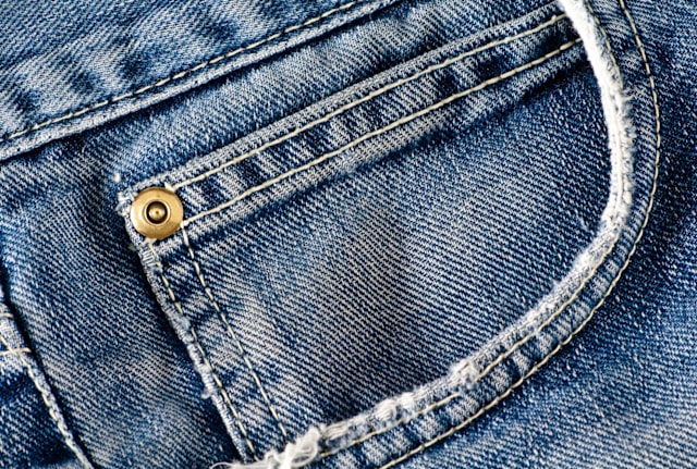 Jeans sometimes have a fake pocket. There are reasons for that, but not they're not necessarily good ones.