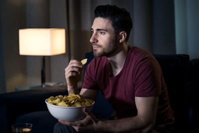 Watching television can influence how much we eat.
