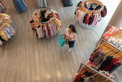 Retail stores want to give you plenty of overhead space. There's a scientific reason why.