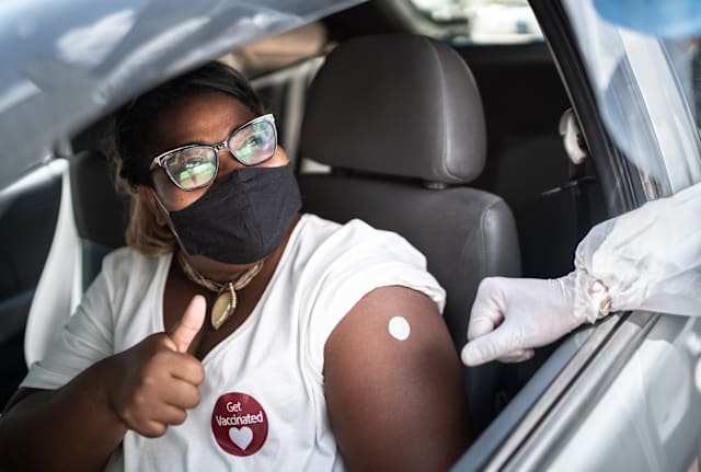 A post-vaccine thumbs up is recommended.