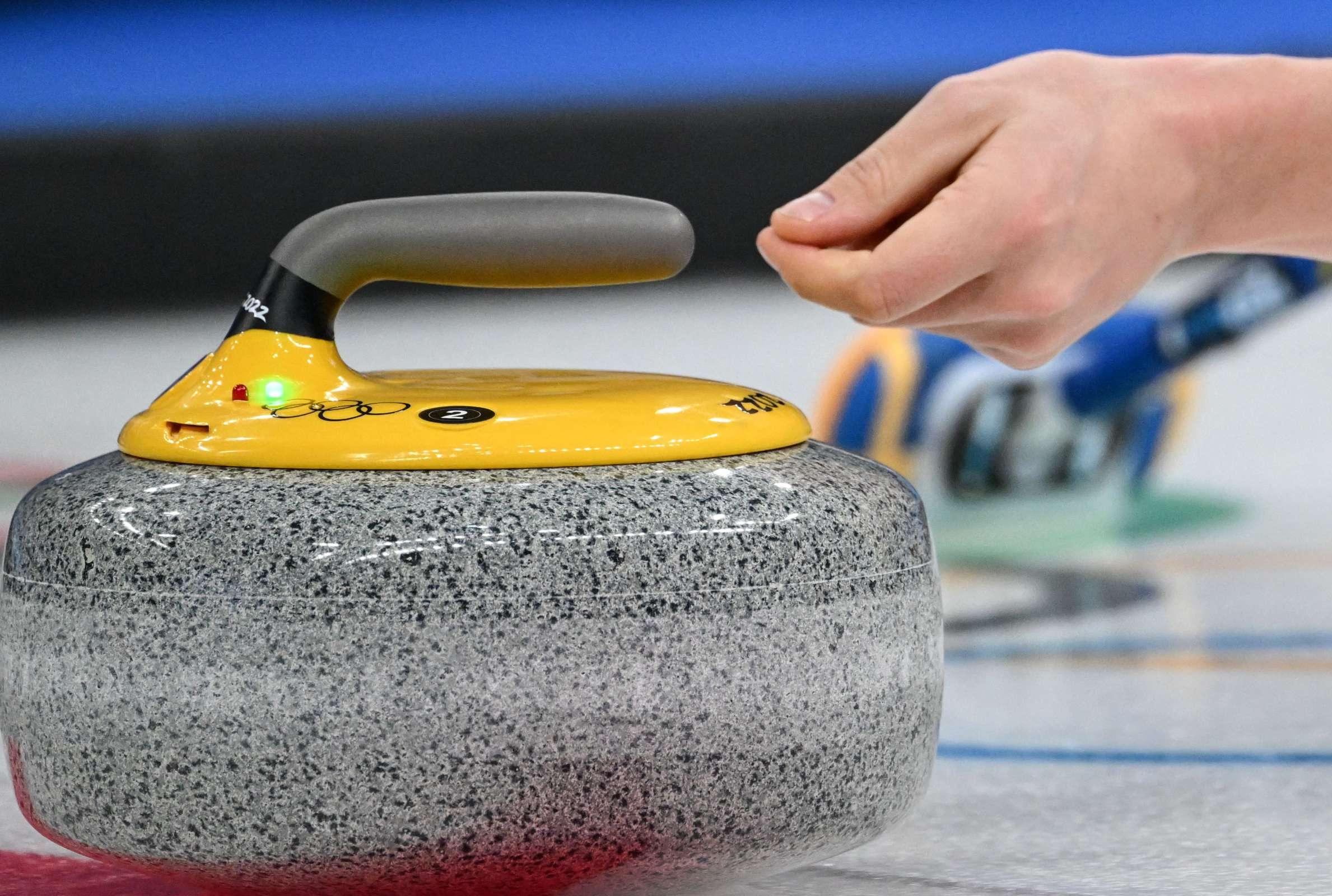 What Are Those Red and Green Lights on Curling Stones? - Vimarsana News