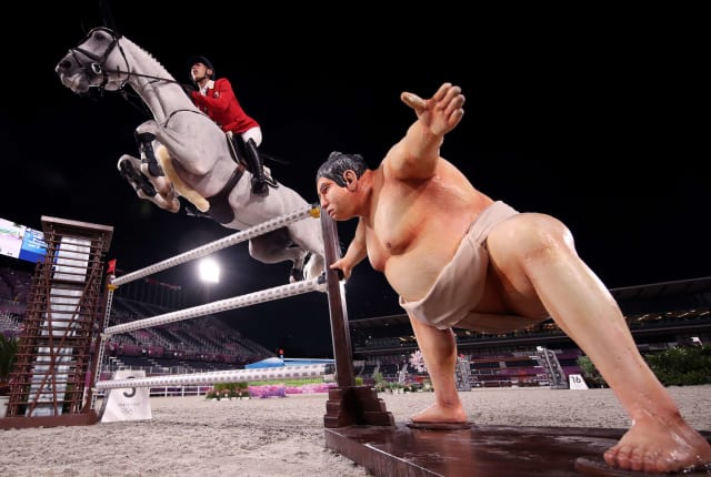 Japanese equestrian Koki Saito competes at the Tokyo Olympics. 