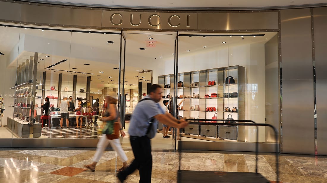 People walk trough a Manhattan mall.