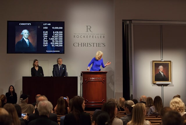 Christie's auctioneer Tash Perrin conducts a sale.