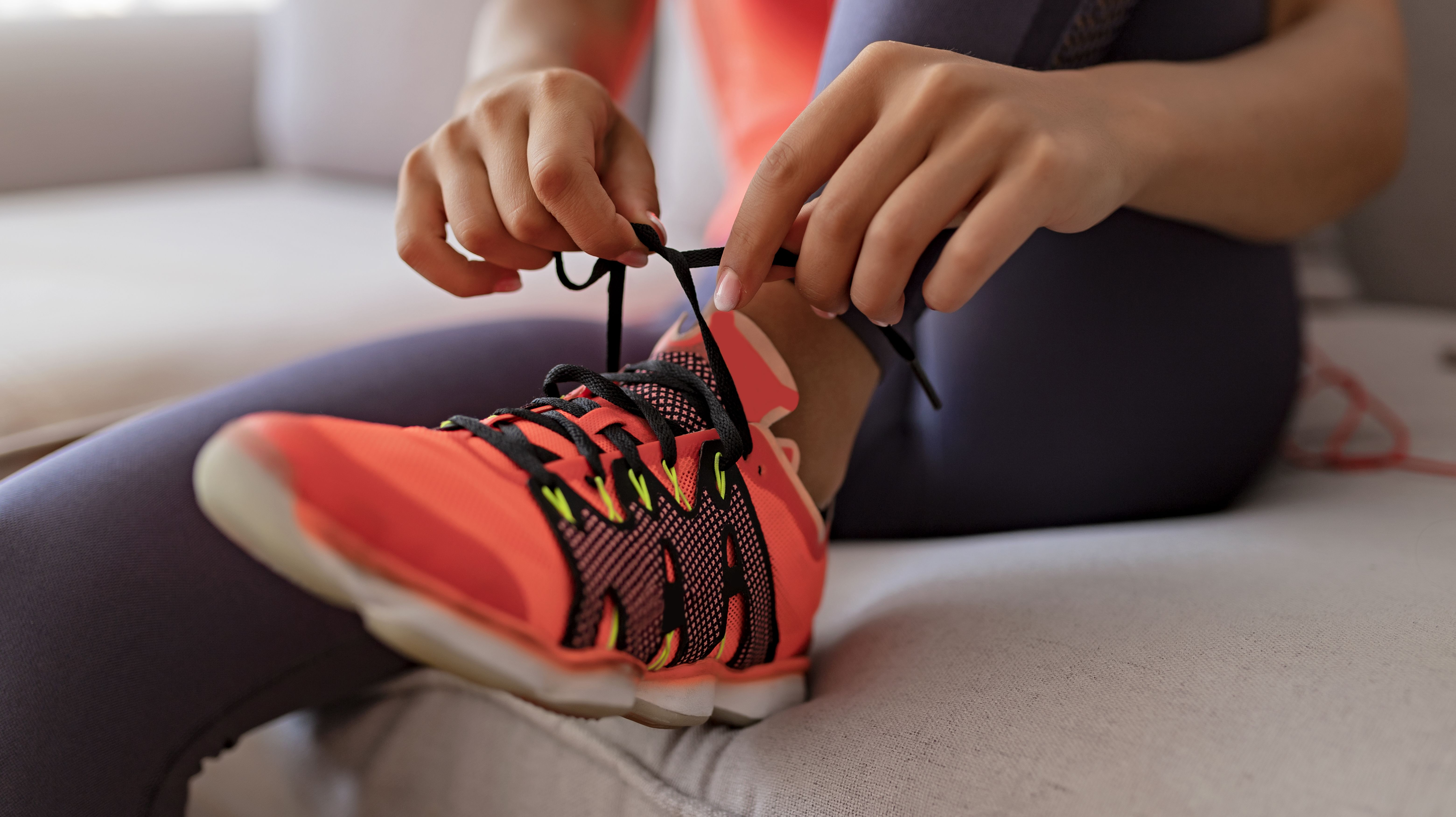 The Reason Sneakers Have an Extra Set of Holes Mental Floss