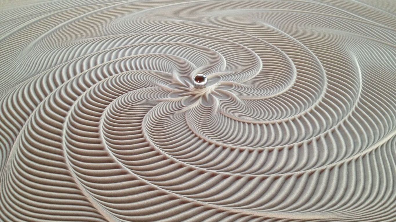 Hypnotic Coffee Table Creates Sand Art With a Marble Mental