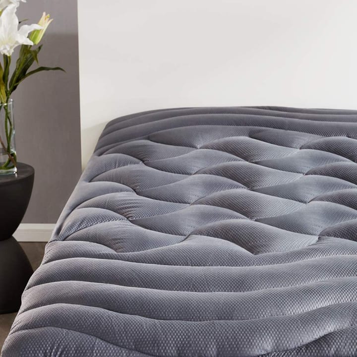 SLEEP ZONE Cooling Queen Mattress Pad sitting on a mattress in a bedroom