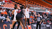 Princeton's Fadima Tall attempts a shot with Rutgers' Nene Ndiaye on defense