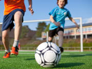 Boys playing soccer