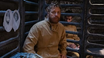 RESIDENT ALIEN -- "Prisoners" Episode 401 -- Pictured: (l-r) Alan Tudyk as Harry Vanderspeigle, Paul Piaskowski as Robert -- (Photo by: James Dittiger/USA Network)