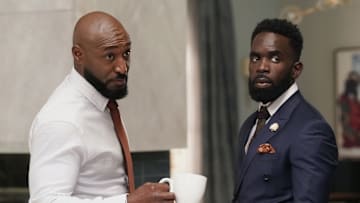 BEL-AIR -- "Gimme A Break" Episode 308 -- Pictured: (l-r) Adrian Holmes as Phil, Jimmy Akingbola as Geoffrey  (Photo by: Greg Gayne/PEACOCK)