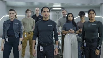 THE ARK -- "We Dont Kill Our Own" Episode 208 -- Pictured: (l-r) Christie Burke as Lt. Sharon Garnet, Ryan Adams as Angus Medford, Pavle Jerinic as Felix Strickland, Reece Ritchie as Lt. Spencer Lane, Jadran Malkovich as Dr. Marsh, Shalini Peiris as Dr. Sanjivni Kabir, Stacey Read as Alicia Nevins, Diana Bermudez as Kimi -- (Photo by: Aleksandar Letic/Ark TV Holdings, Inc./SYFY)