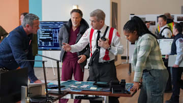 CHICAGO P.D. -- "In The Trenches: Part III" Episode 12014 -- Pictured: (l-r) Taylor Kinney as Kelly Severide, Steven Weber as Dr. Dean Archer, Dermot Mulroney as Chief Dom Pascal, Toya Turner as Kiana Cook -- (Photo by: Elizabeth Sisson/NBC)