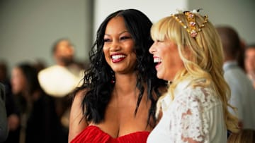 THE REAL HOUSEWIVES OF Beverly Hills -- "The Crown Isn't So Heavy" Episode 1001 -- Pictured: (l-r) Garcelle Beauvais, Sutton Stracke -- (Photo by: Kathy Boos/Bravo)