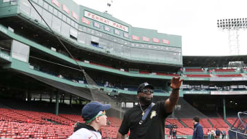 May 15, 2024; Boston, Massachusetts, USA; Former Red Sox first baseman and designated hitter David Ortiz visits a young fan from the Make A Wish Foundation before a game against the Tampa Bay Rays at Fenway Park.