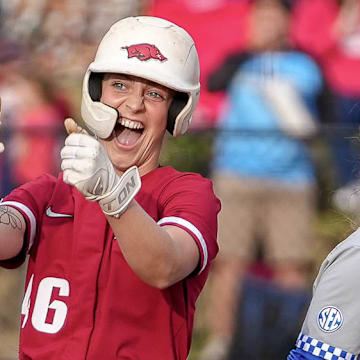 Arkansas Razorbacks Kailey Wyckoff gives a thumbs-up to the dugout against the Kentucky Wildcats at Bogle Park in Fayetteville, Ark