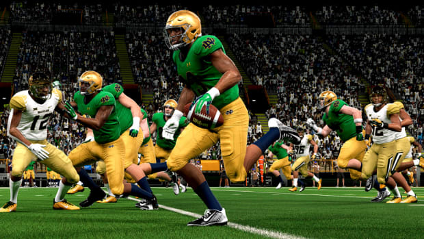 Notre Dame Fighting Irish football player running with the ball in EA College Football 25.