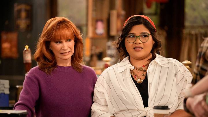 HAPPY'S PLACE -- "A New Chapter" Episode 214 -- Pictured: (l-r) Reba McEntire as Bobbie, Belissa Escobedo as Isabella -- (Photo by: Casey Durkin/NBC)