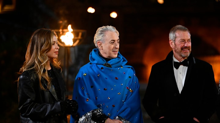 THE TRAITORS -- "The Day of Reckoning is Upon Us" Episode 311 -- Pictured: (l-r) Gabby Windey, Alan Cumming, Lord Ivar Mountbatten -- (Photo by: Euan Cherry/Peacock)