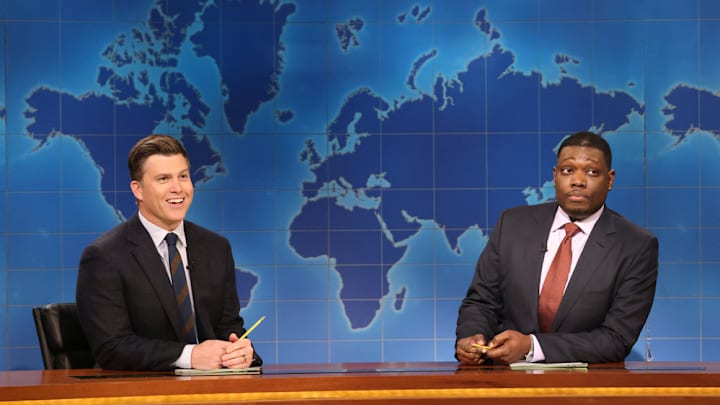 SATURDAY NIGHT LIVE -- Episode 1893 -- Pictured: (l-r) Anchor Colin Jost and anchor Michael Che during Weekend Update on Saturday, December 20, 2025 -- (Photo by: Will Heath/NBC)