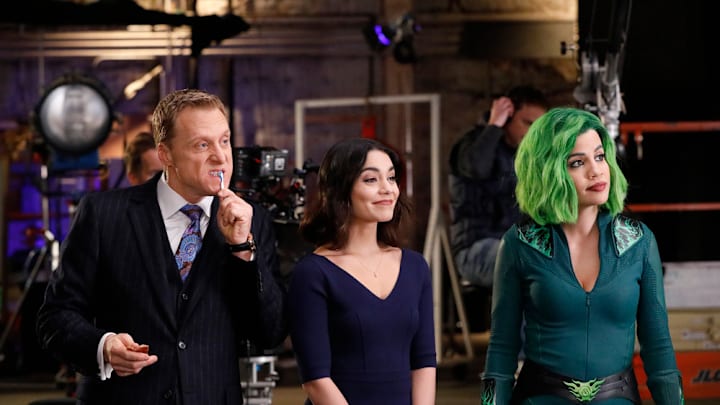 POWERLESS -- "Green Furious" Episode 111 -- Pictured: (l-r) (l-r) Alan Tudyk as Van, Vanessa Hudgens as Emily. Natalie Morales as Green Fury -- (Photo by: Evans Vestal Ward/Warner Bros. Entertainment/NBC)