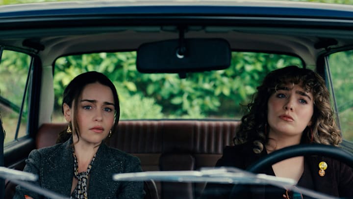 PONIES -- Pictured: (l-r) Emilia Clarke as Bea, Haley Lu Richardson as Twila -- (Photo by: PEACOCK