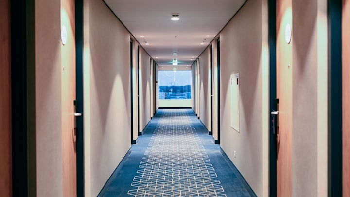 Hotel hallway with patterned carpet