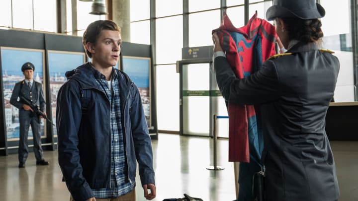 Peter Parker(TOM HOLLAND) is stopped by an Italian Customs Officer (GIADA BENEDETTI) in Columbia Pictures' SPIDER-MAN:  FAR FROM HOME.