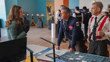 CHICAGO P.D. -- "In The Trenches: Part III" Episode 12014 -- Pictured: (l-r) Marina Squerciati as Officer Kim Burgess, Taylor Kinney as Kelly Severide, Dermot Mulroney as Chief Dom Pascal -- (Photo by: Elizabeth Sisson/NBC)