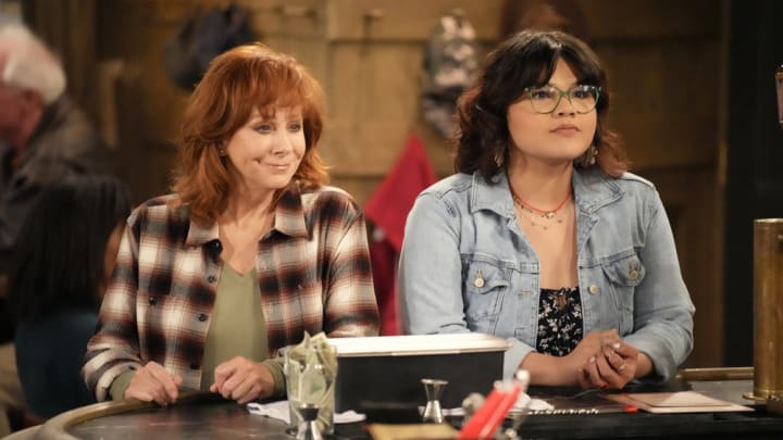 HAPPY'S PLACE -- "Pilot" -- Pictured: (l-r) Reba McEntire as Bobbie, Belissa Escobedo as Isabella -- (Photo by: Casey Durkin/NBC)