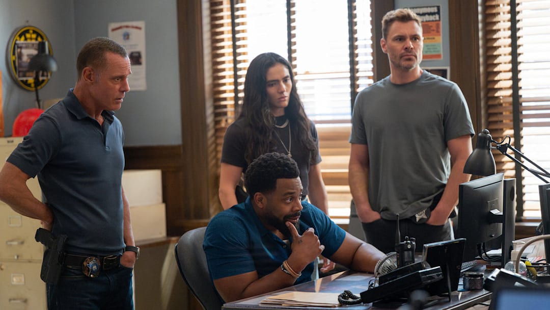 CHICAGO PD -- "Canaryville" Episode 1303 -- Pictured: (l-r) Jason Beghe as Hank Voight, LaRoyce Hawkins as Officer Kevin Atwater, Arienne Mandi as Eva Imani, Patrick John Flueger as Officer Adam Ruzek -- 