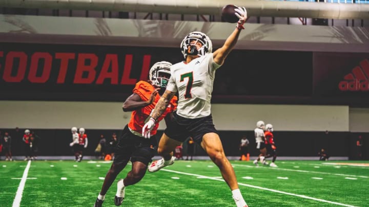 Xavier Restrepo (7) reaching for a one-handed catch during fall camp.